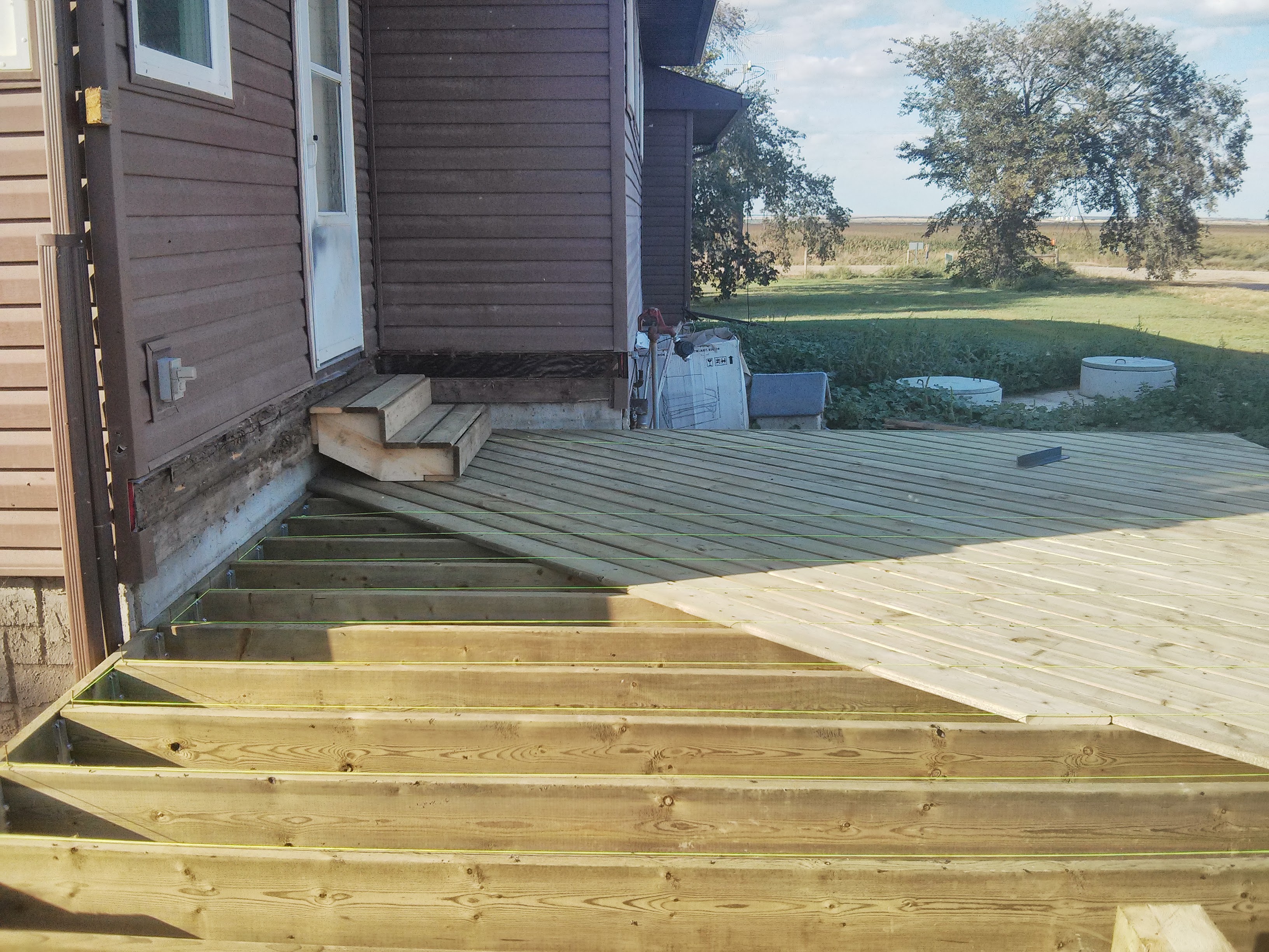Joist Framing Against the Farmhouse