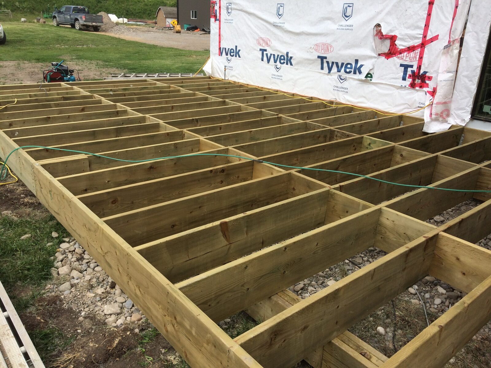 Joist Layout Off the Tyvek-Wrapped Wall